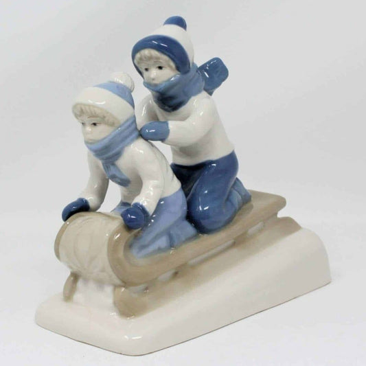 Figurine, Boy & Girl On Sled, Porcelana de Cuernavaca, Mexico, Vintage