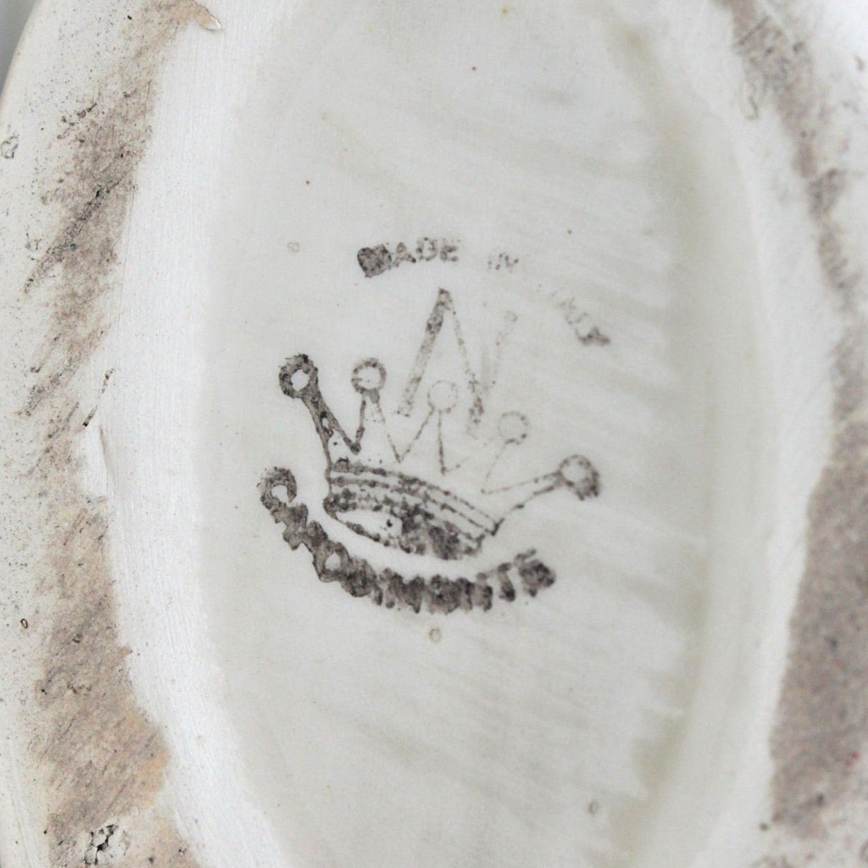 close up view of Capodimonte backstamp. N with Crown logo, made in italy.