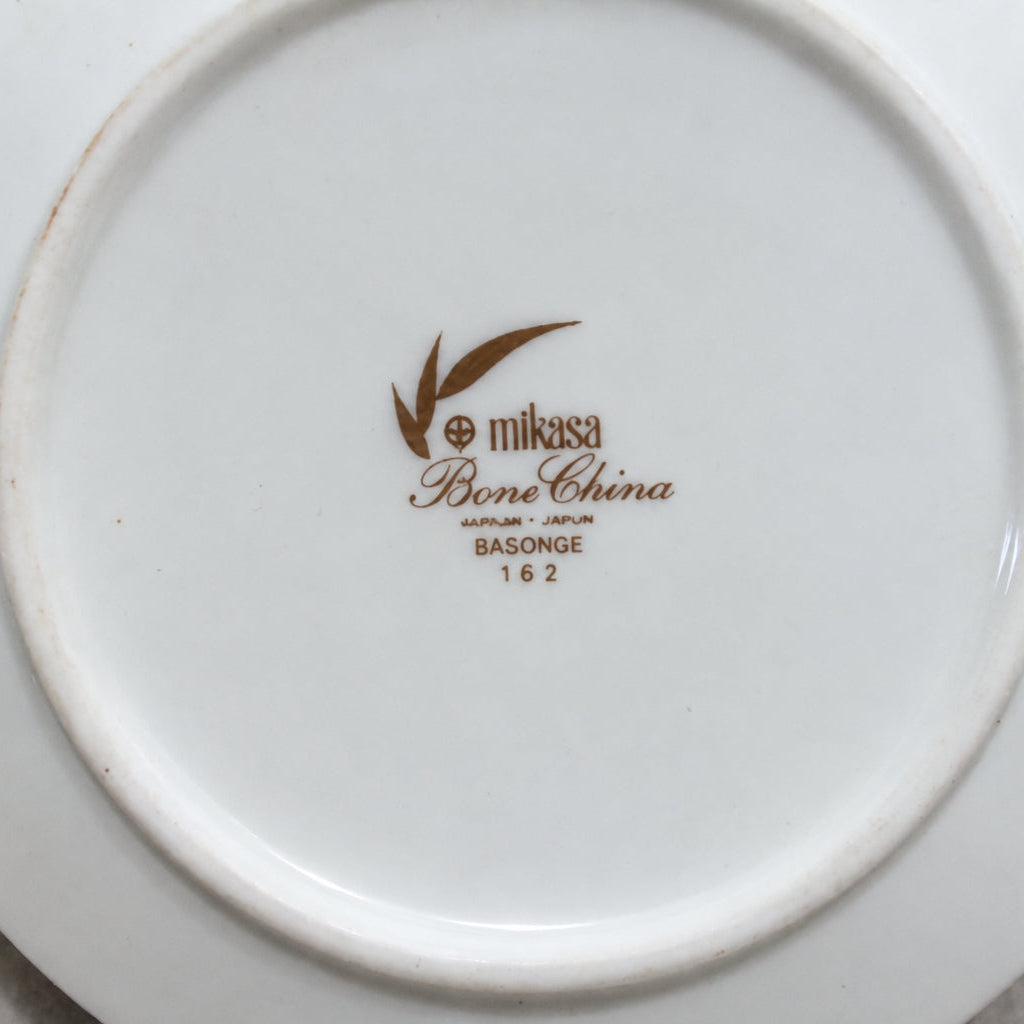 White plate with Mikasa Bone China logo on a white background