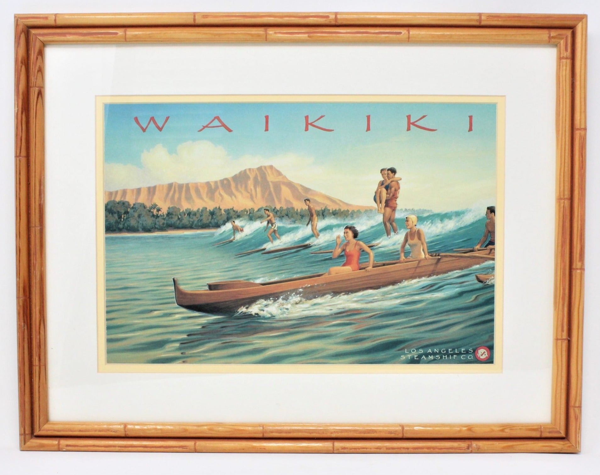 Framed and matted print featuring surfers in Waikiki, with a bamboo frame, displayed in a frame with a label at the top.