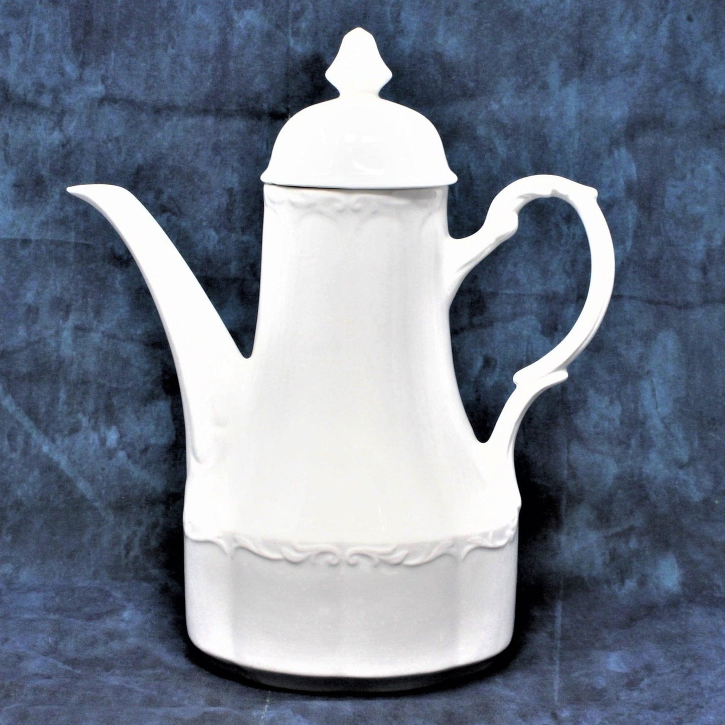 Vintage white ironstone ceramic coffee pot by J&G Meakin. Embossed swirl design on the top rim and bottom third.