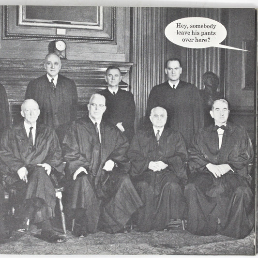 Black and white photo of a formal group of men in suits with a humorous modern overlay.