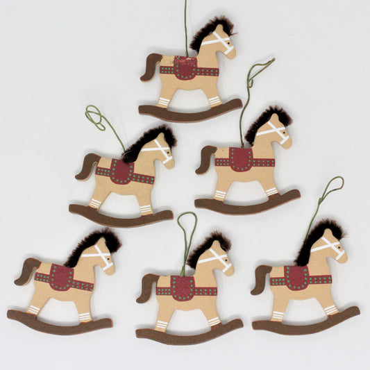 A set of six vintage mini wooden rocking horse ornaments with fuzzy manes, hand painted.