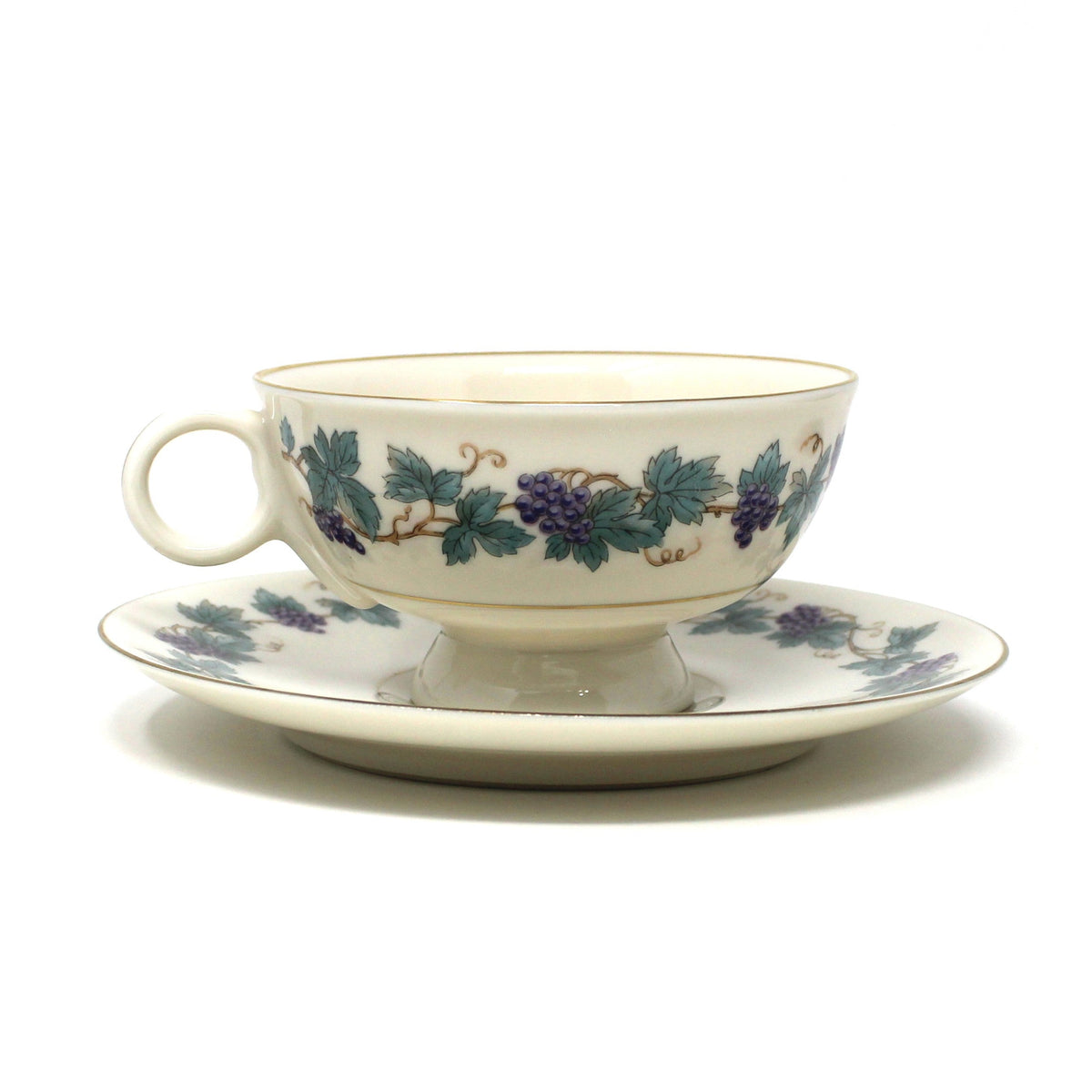Vintage Tea Cup & matching Saucer from Theodore Haviland, in the Arbor pattern with grape clusters and leaves.