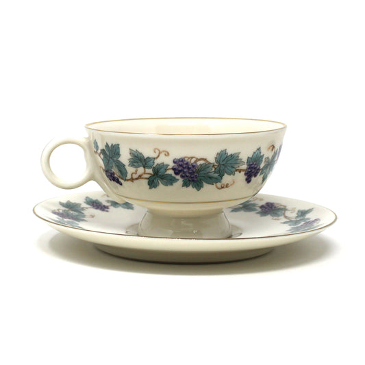 Vintage Tea Cup & matching Saucer from Theodore Haviland, in the Arbor pattern with grape clusters and leaves.