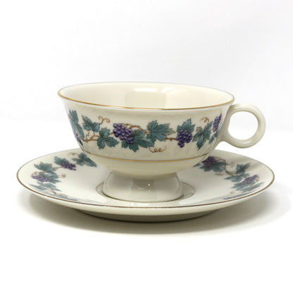 back view of teacup and saucer, from Theodore Haviland, in the Arbor pattern with grape clusters and leaves.