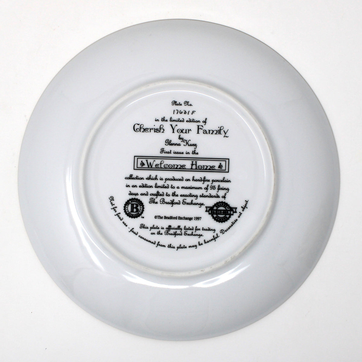 Back view of decorative plate, "Cherish Your Family" by Glenna Kurz. First issue 1997 Bradford Exchange, Welcome Home Collection.