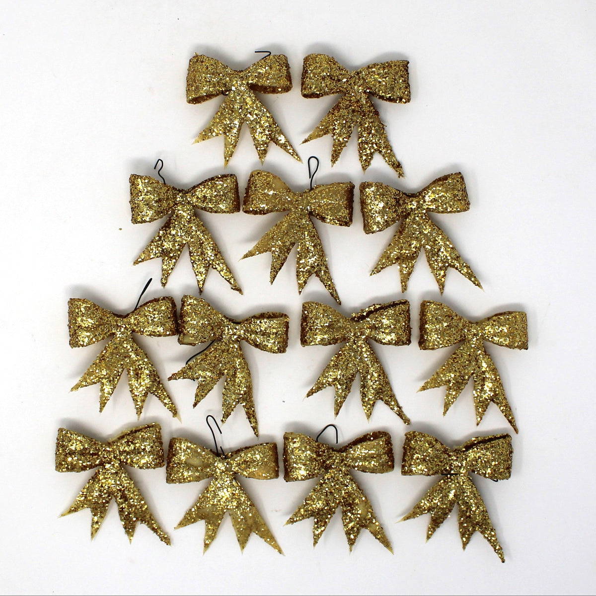 set of 13 gold bow shaped Christmas ornaments.  Covered in glitter, great for crafting too.