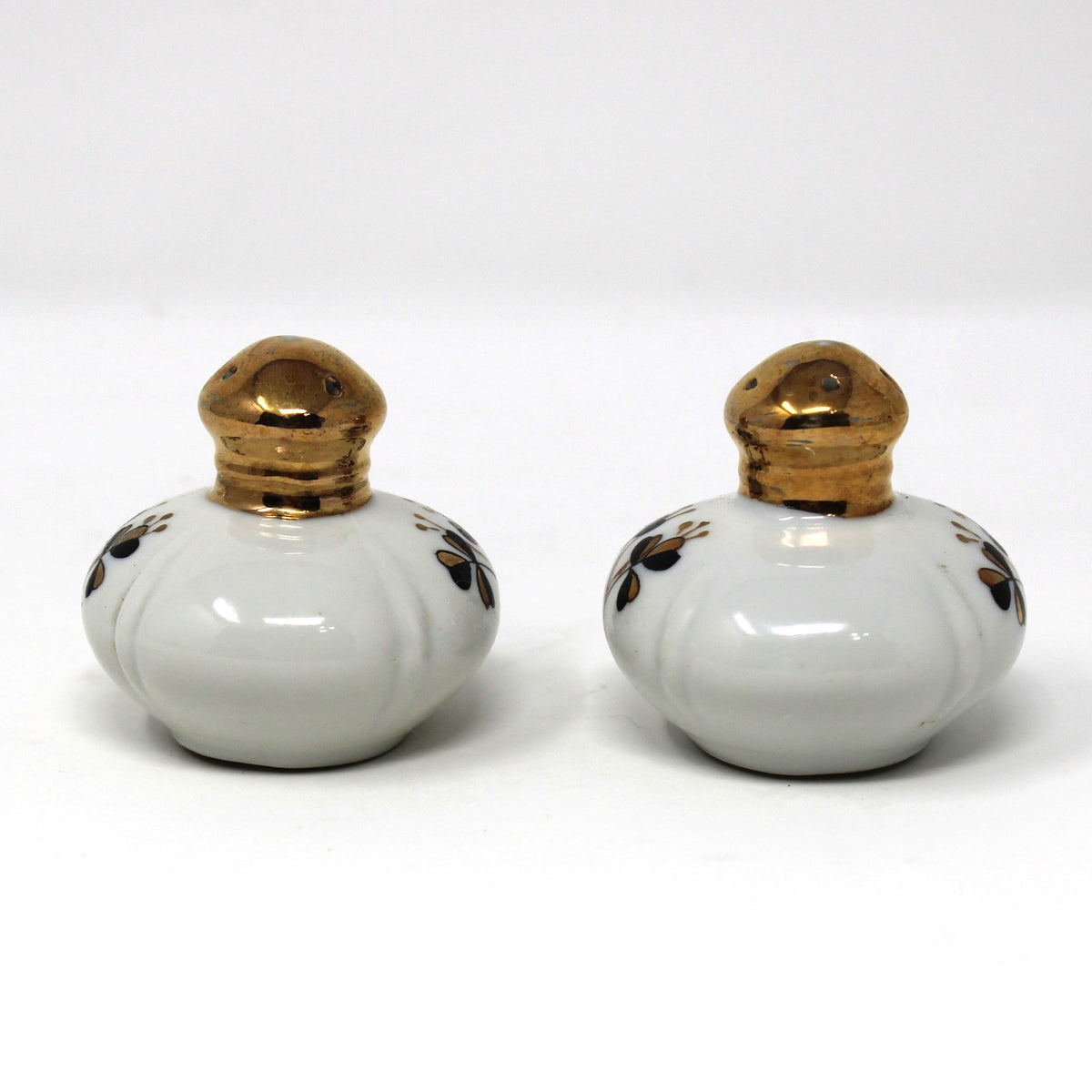 Salt and Pepper Shakers: Ucagco, Round Porcelain Gold Tops, Black / Gold Clovers, Vintage Japan, 1940s