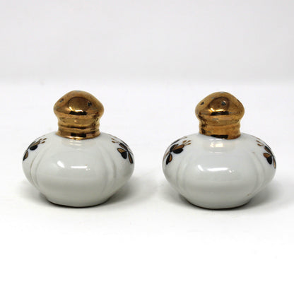 Salt and Pepper Shakers: Ucagco, Round Porcelain Gold Tops, Black / Gold Clovers, Vintage Japan, 1940s