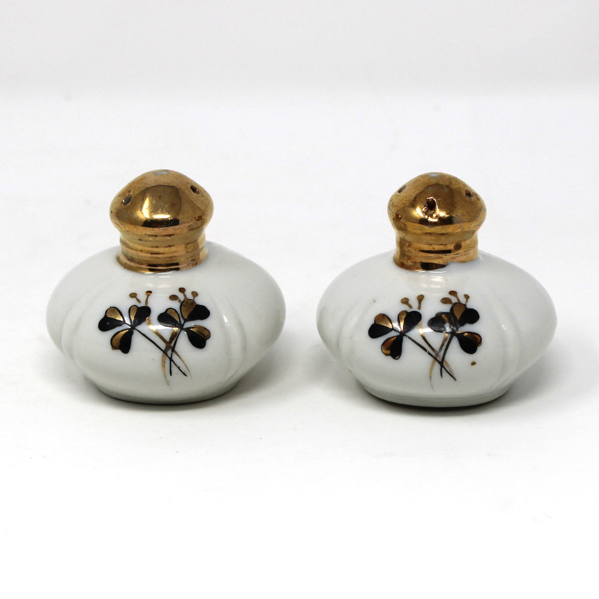 Salt and Pepper Shakers: Ucagco, Round Porcelain Gold Tops, Black / Gold Clovers, Vintage Japan, 1940s