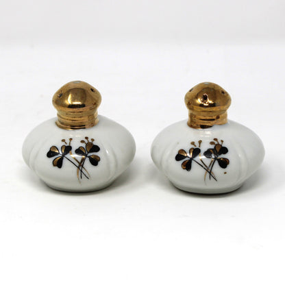 Salt and Pepper Shakers: Ucagco, Round Porcelain Gold Tops, Black / Gold Clovers, Vintage Japan, 1940s