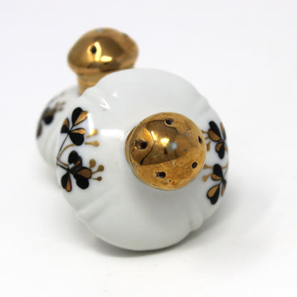 Salt and Pepper Shakers: Ucagco, Round Porcelain Gold Tops, Black / Gold Clovers, Vintage Japan, 1940s