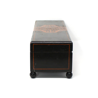 side view of black wood box