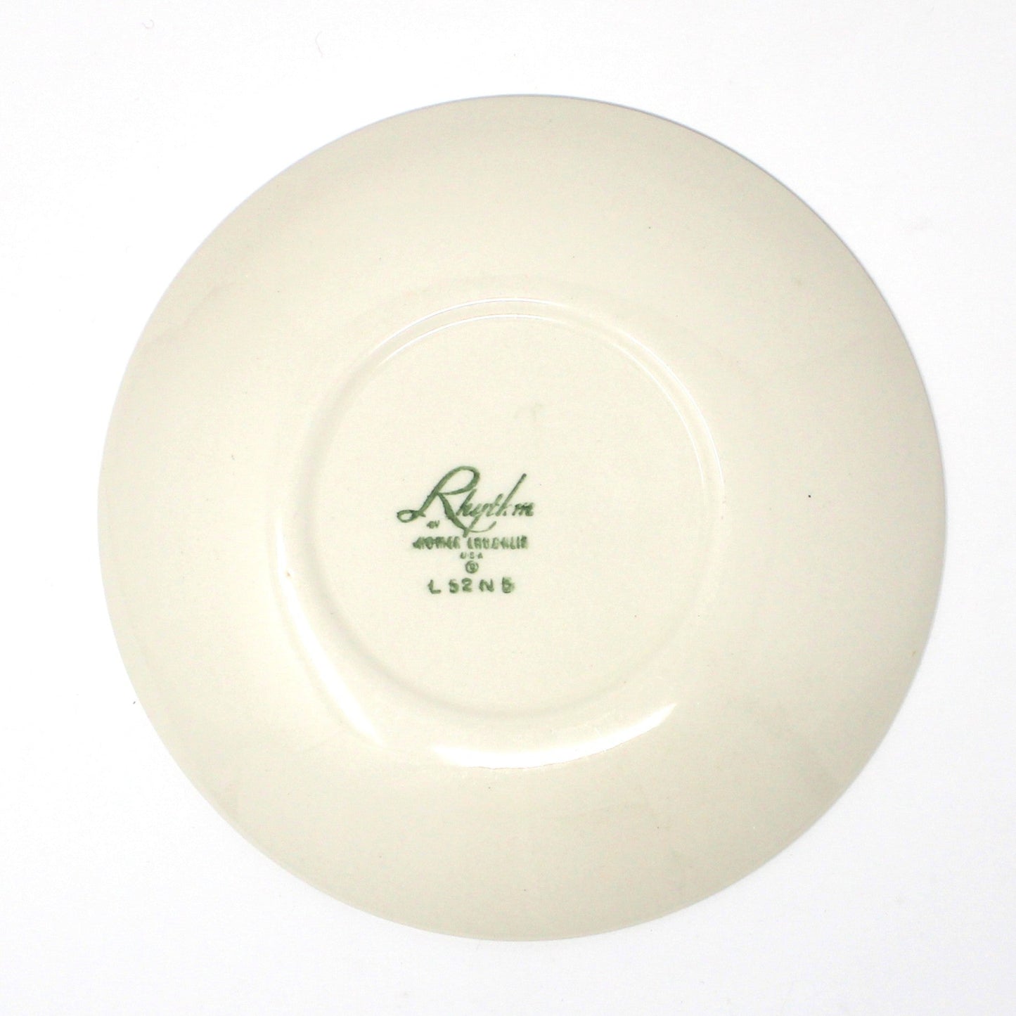 Back view of vintage Homer Laughling ceramic plate with a logo 
