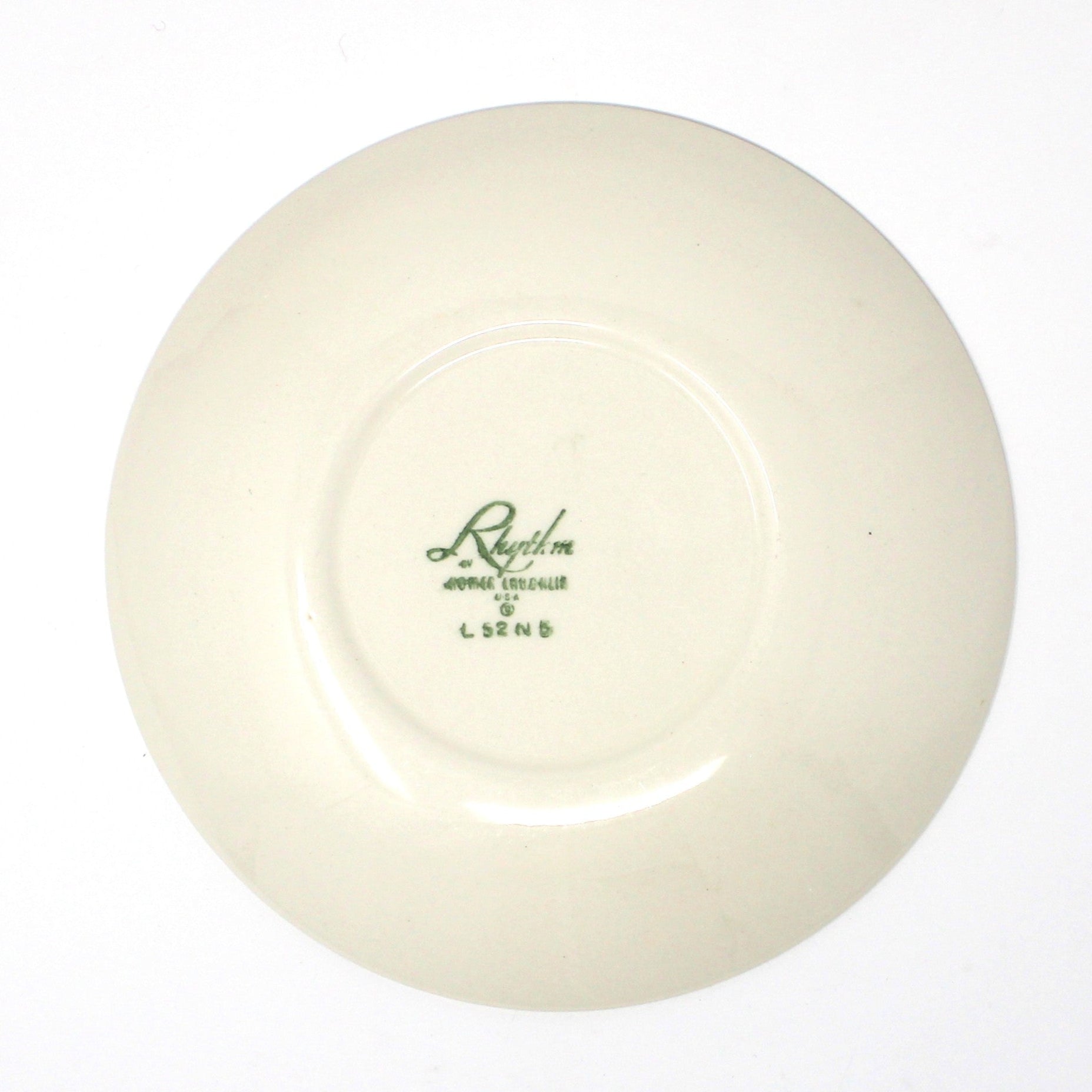 Back view of vintage Homer Laughling ceramic plate with a logo 