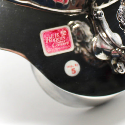 Close-up of a original FB Rogers brand sticker on silverplated serving bowl