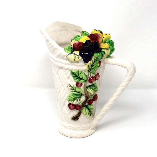 Decorative ceramic pitcher from Lefton.  Vintage Tutti Frutti design with basketweave pattern.