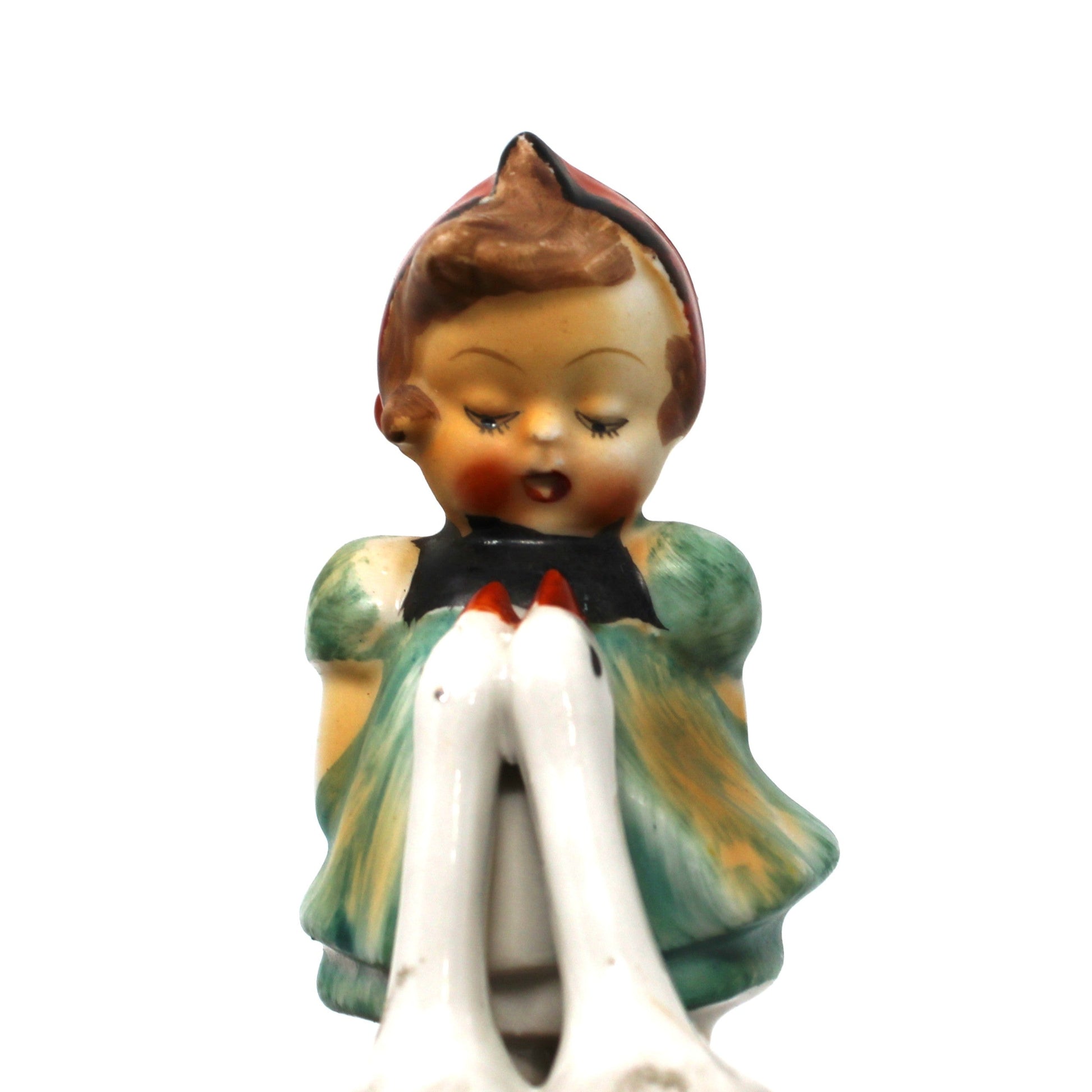 Vintage-style figurine of a girl with a blue dress and two geese.  Hummel style.