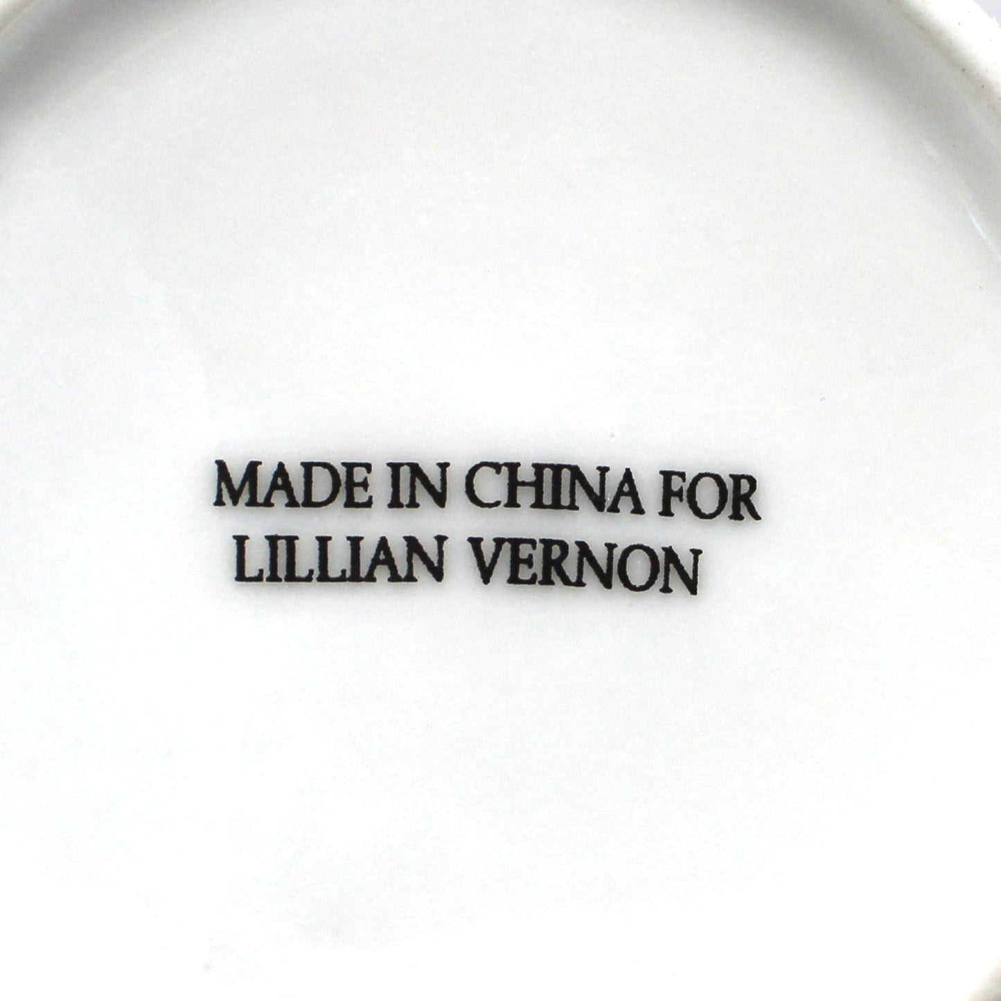 Backstamp on porcelain mug from LILLIAN VERNON' text 
