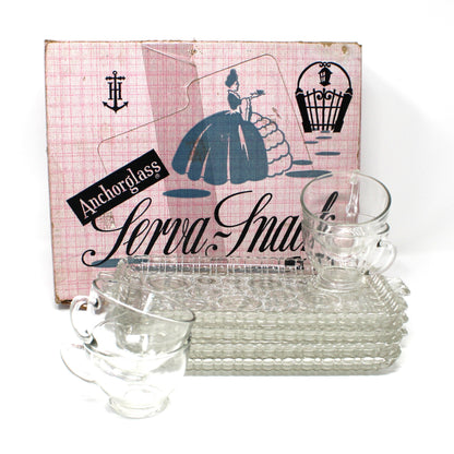 Clear plates and cups set for four, with pink original box labeled 'Serva Snack'.  Vintage Anchor Hocking.