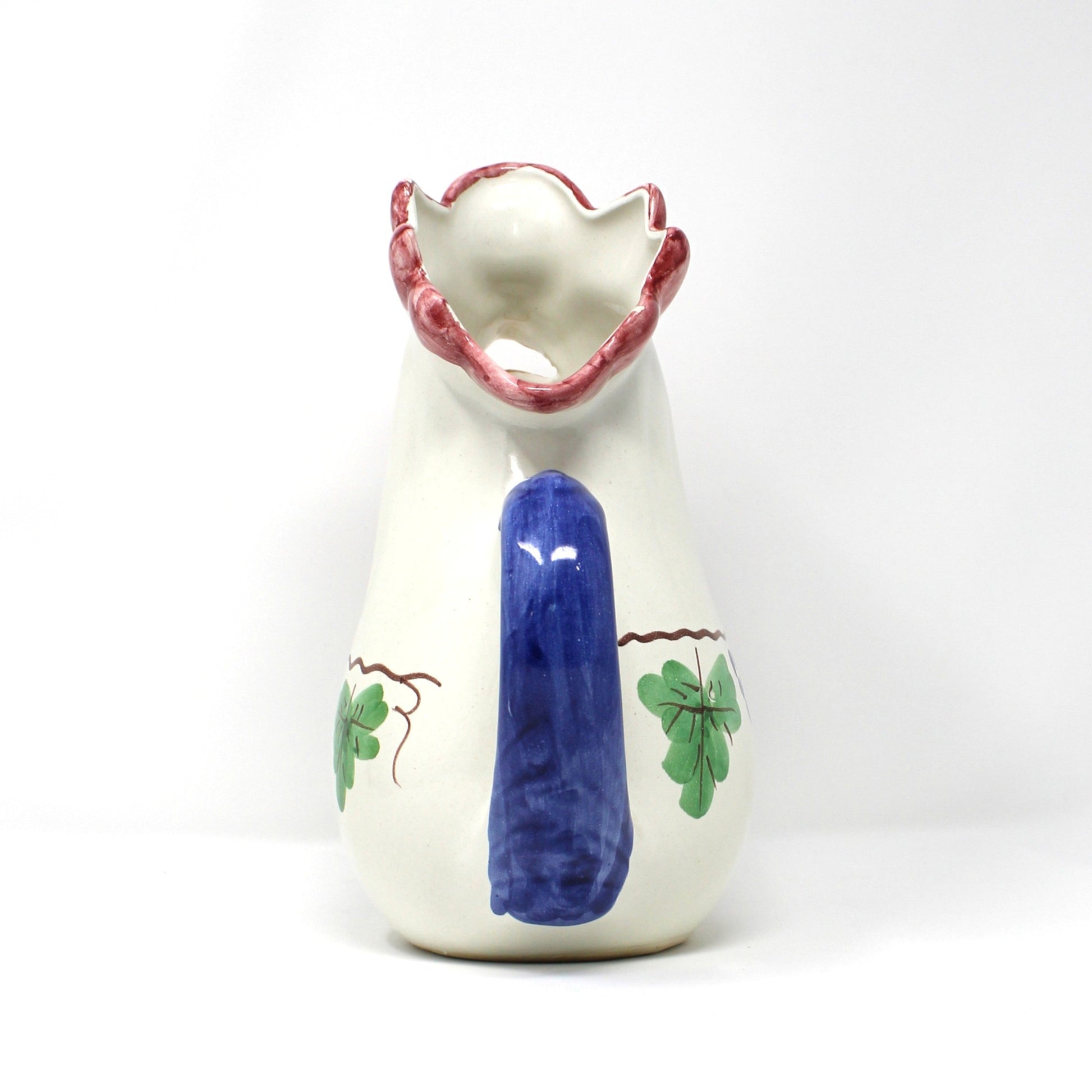 Back view of rooster-shaped pitcher. Italian Vietri ceramic.  