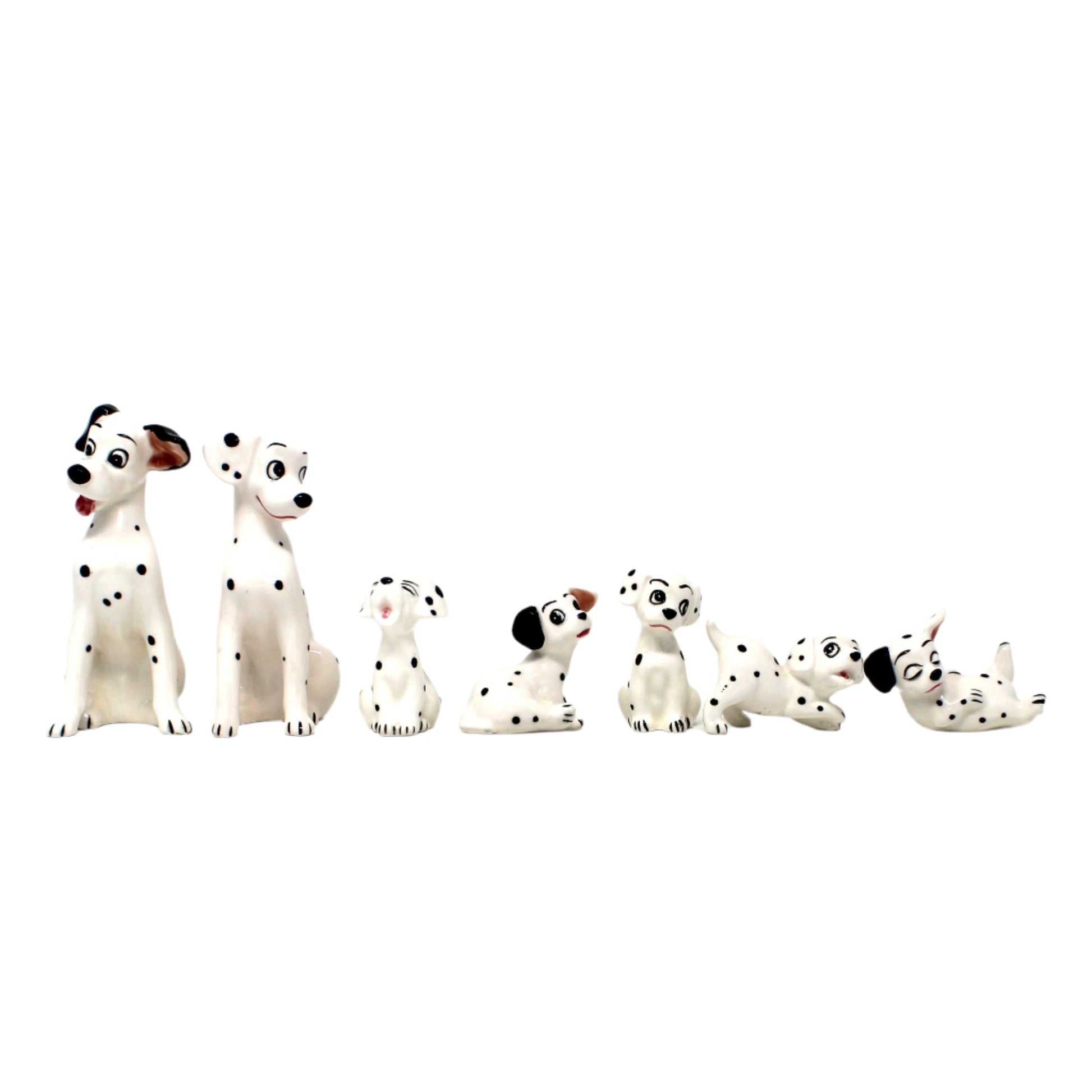 Set of 7 Vintage Disney 101 Dalmatians dog figurines.