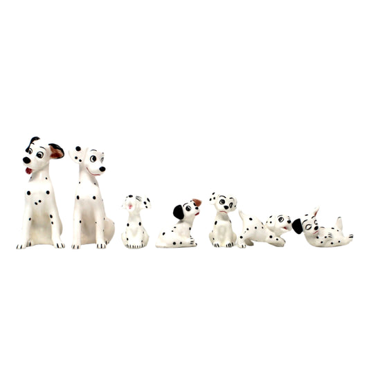Set of 7 Vintage Disney 101 Dalmatians dog figurines.
