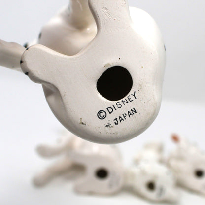 Close up view of Vintage Disney backstamp on porcelain 101 Dalmatians figurine.  