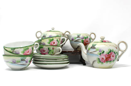 Vintage 15 pc Tea set with pink floral design and green leaves.  Japan import.