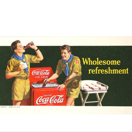 Vintage advertisement ink blotter, featuring two boys in scout uniforms with a Coca-Cola cooler.