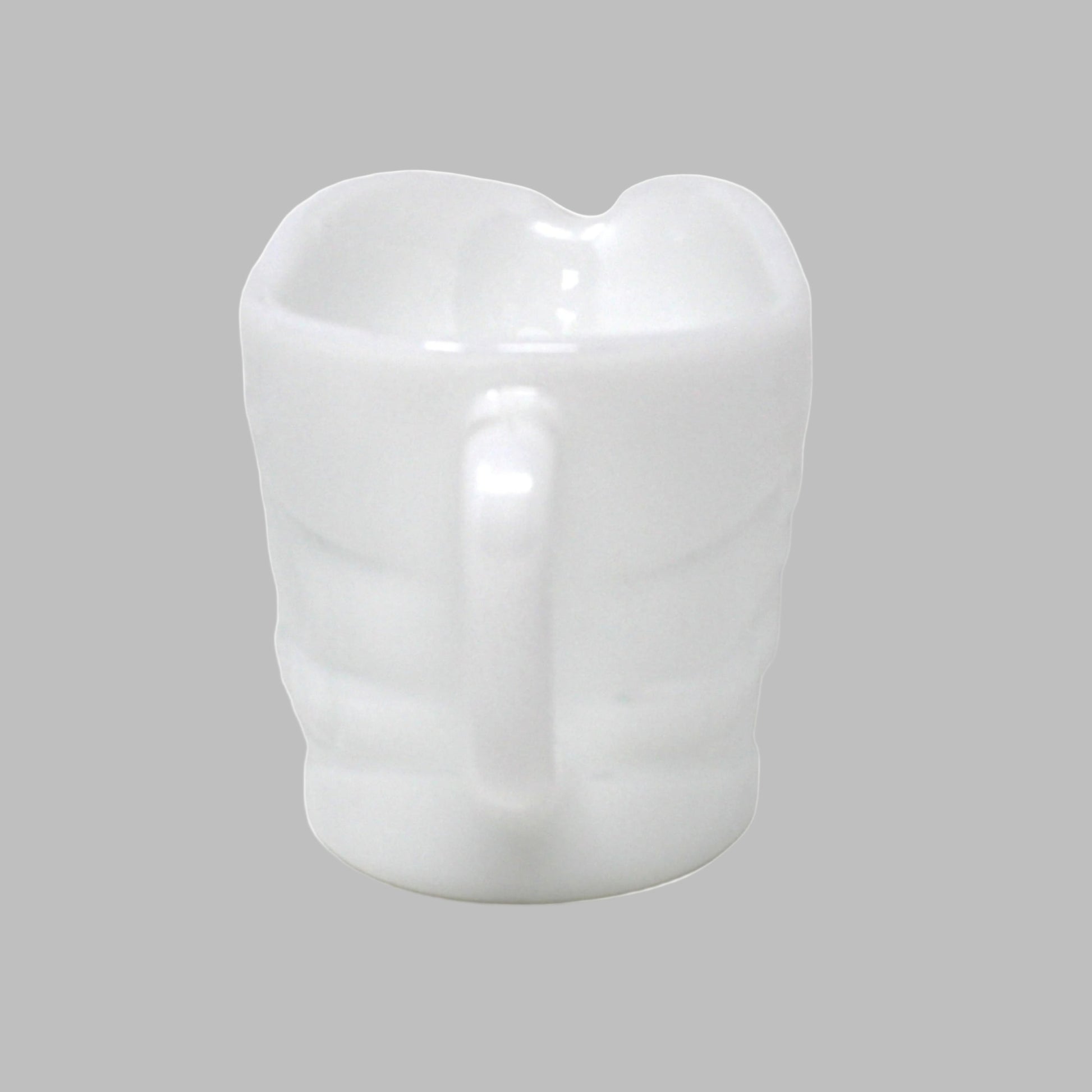 White ceramic mug on a white background