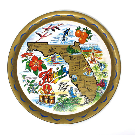 Decorative vintage tin tray with a map of Florida featuring various landmarks, colorful collectible tray. 