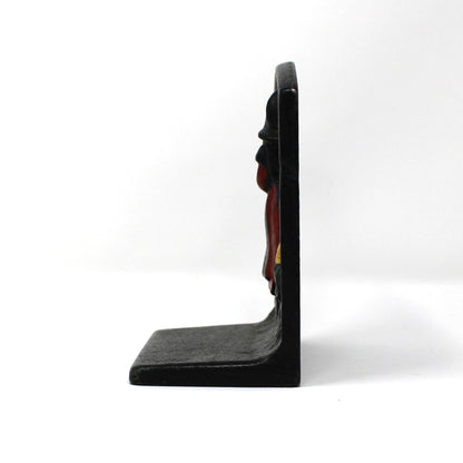 Side view of vintage cast iron, black bookend from Wilton Products, USA