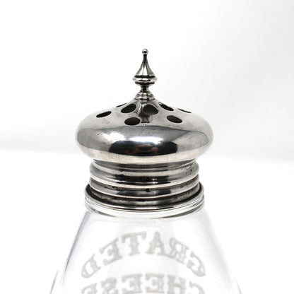 Glass cheese shaker with silver top by F. M. Whiting & Co