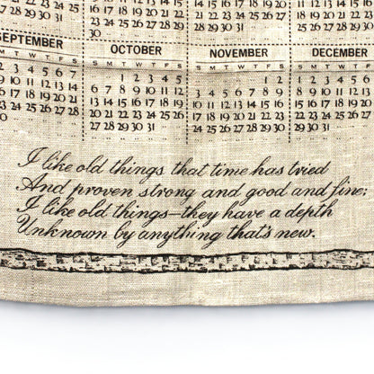 Calendar printed on fabric with a quote about old things