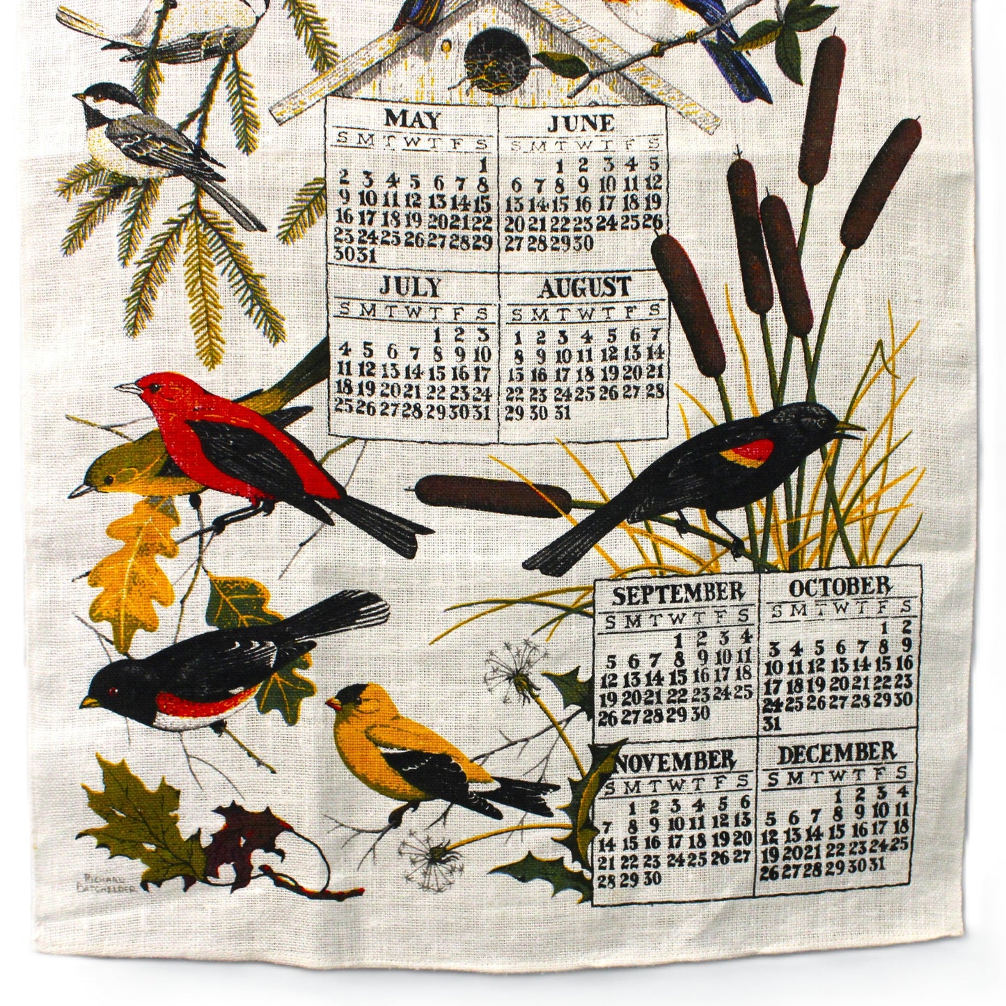 Tea towel with bird and calendar design on a white background