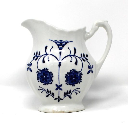 Vintage Ironstone ceramic creamer, J&G Meakin  Copenhagen pattern, blue florals on a white background