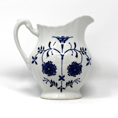 Vintage Ironstone ceramic creamer, J&G Meakin Copenhagen pattern.  Blue and White florals on white background