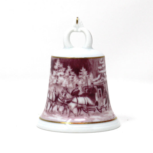 Vintage Porcelain Pink / Purple (Fuchsia), ceramic bell with a winter scenic landscape and horse and carriage design from AK Kaiser, German Porcelain.  