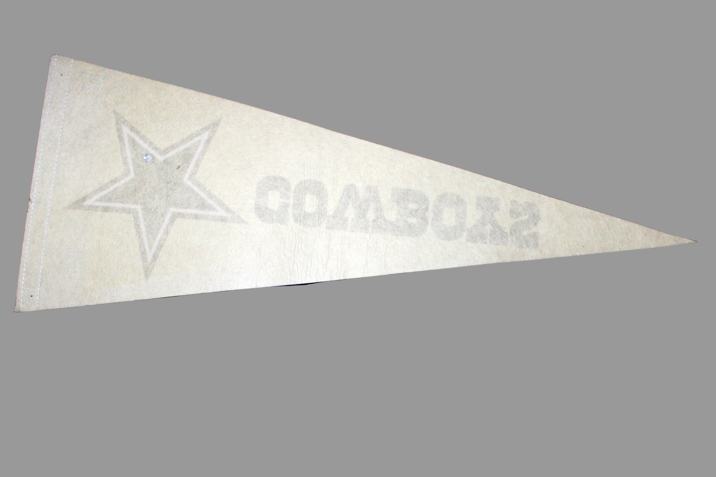 pennant with star logo and 'Cowboys' text on a blue background