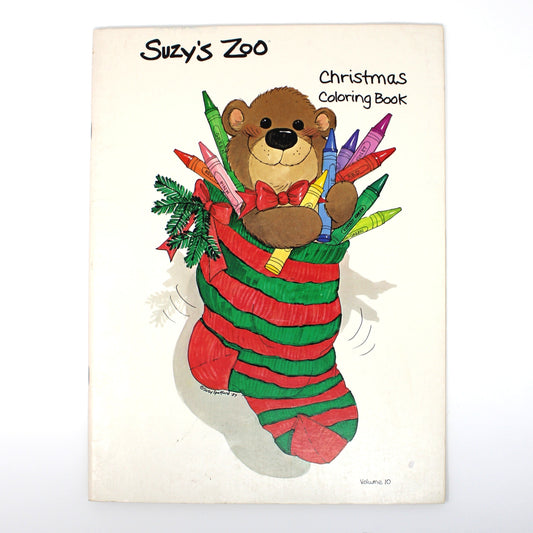 Cover of a 'Suzy's Zoo Christmas Coloring Book' with a bear in a stocking illustration.