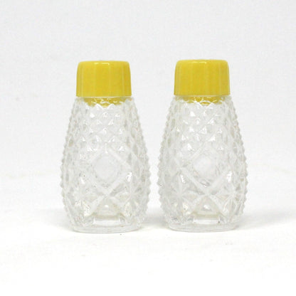 Salt and Pepper Shakers, Pressed Glass with Yellow Bakelite Tops, Vintage