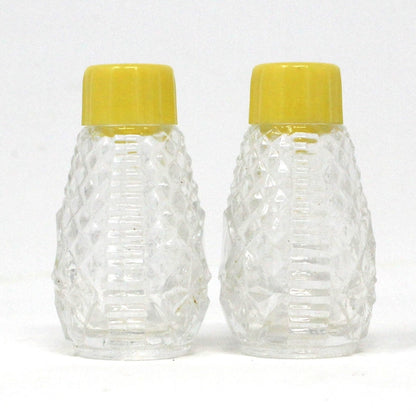 Salt and Pepper Shakers, Pressed Glass with Yellow Bakelite Tops, Vintage