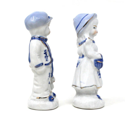 Figurine, Boy and Girl Holding Pets, Blue & White Porcelain, Hand Painted, Vintage Set of 2