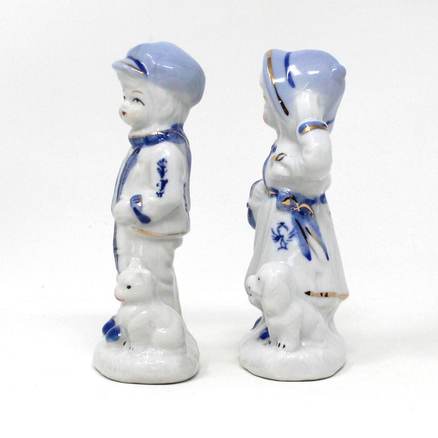 Figurine, Boy and Girl Holding Pets, Blue & White Porcelain, Hand Painted, Vintage Set of 2