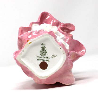 Bottom vase view with maker's mark on vintage porcelain Royal Doulton figurine titled "Top O' The Hill".  Bone China, England.