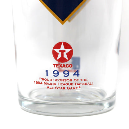 A clear glass tumbler featuring a red and blue Atlanta Braves 1994 Texaco All-Star Game logo