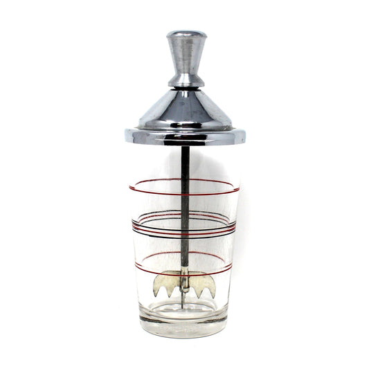 A vintage cocktail mixer / ice crusher.   A polished chrome metal top a clear glass body with red and black decorative rings. Lightning Ice Crusher by North Bros Mfg.