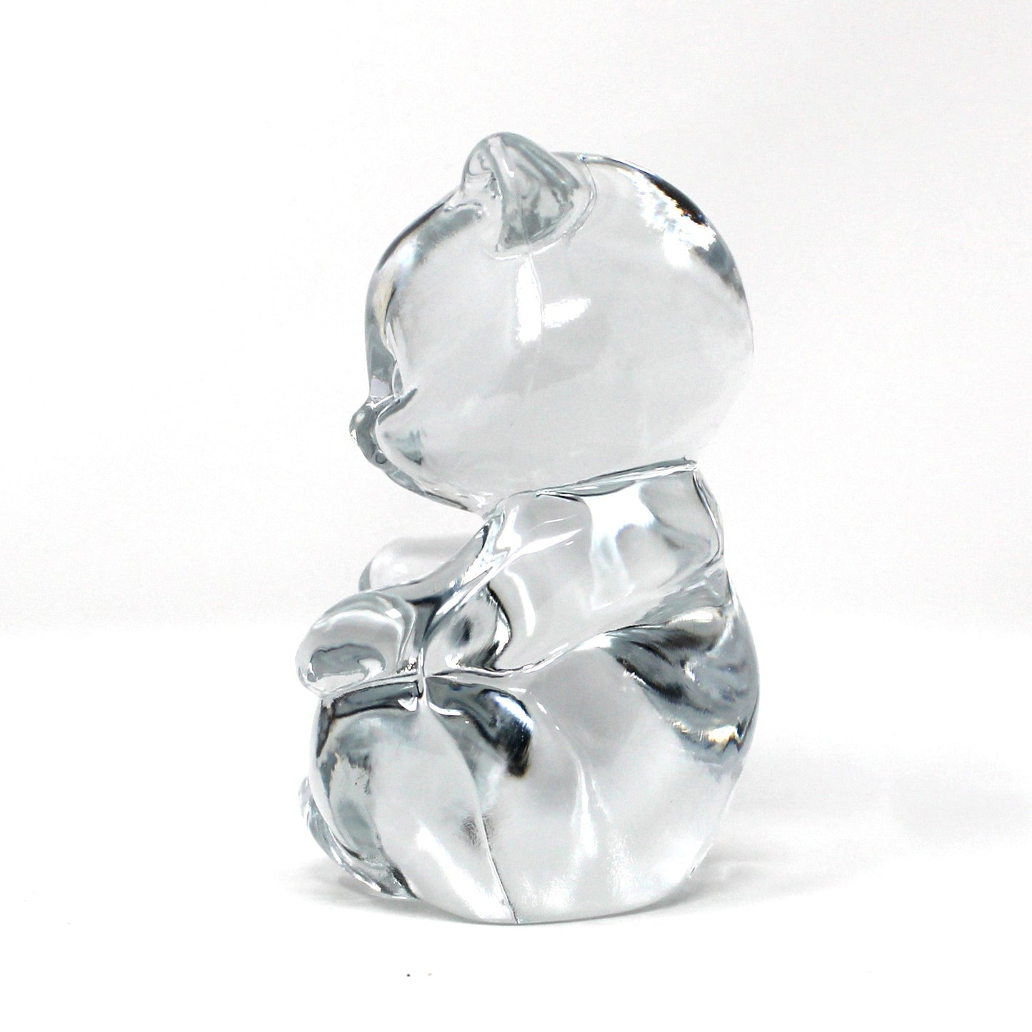 side view of Fenton's vintage clear glass bear figurine / paperweight.  